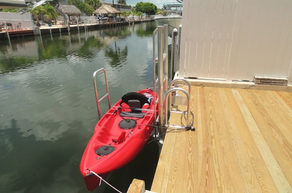 Getting in and out of a kayak is tricky enough