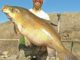 Mandan man catches state record buffalo fish in North Dakota